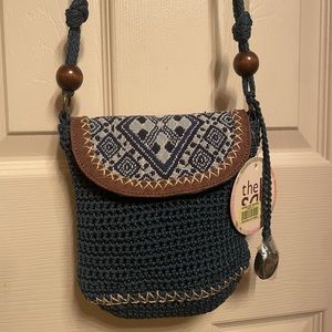 Denim blue “the Sak” bag  length 8 inch  x width 7 inch strap drop 22.5 inch.